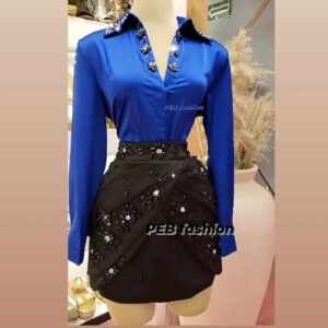 falda plisada c/aplicaciones