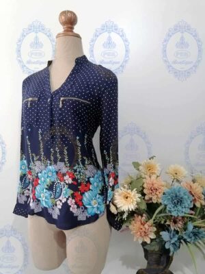 II CAMISA DE PUNTOS Y FLORES