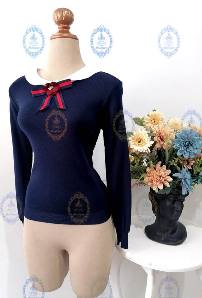 suéter moño con flor