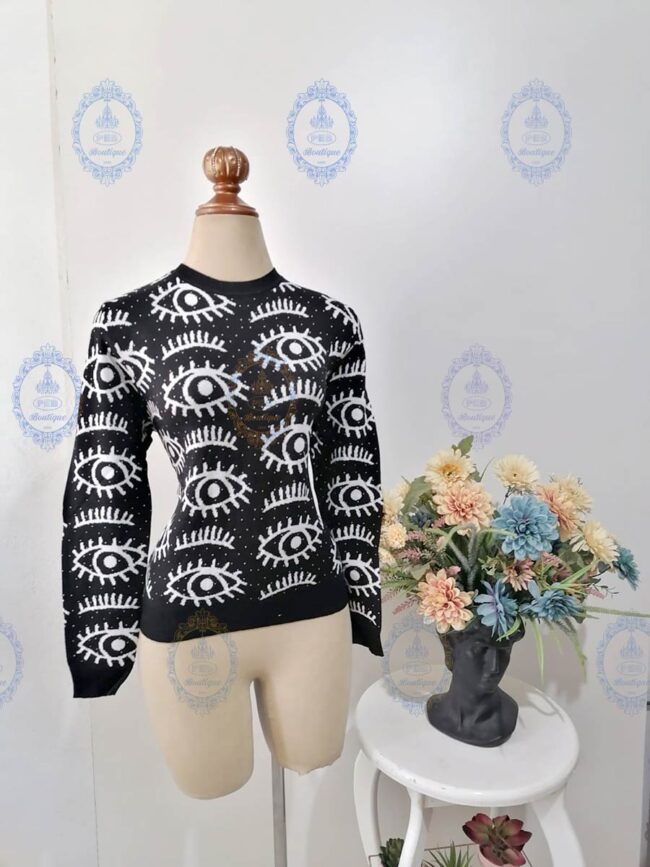 suéter ojos puntos